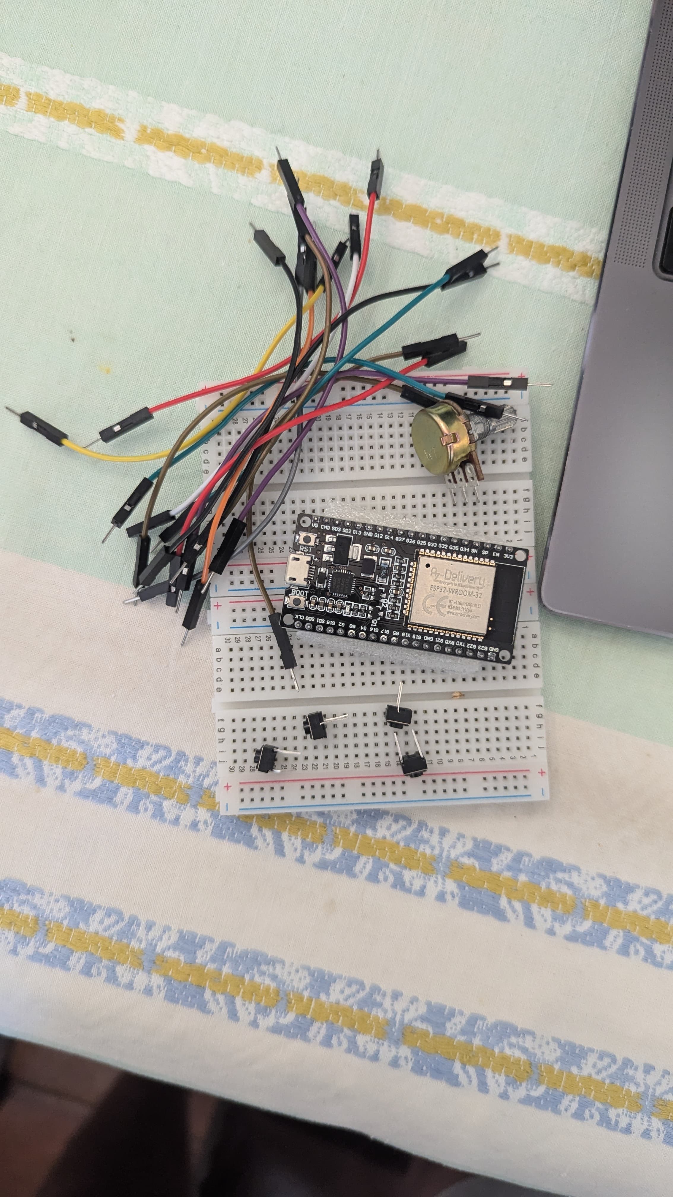 Buttons, a potentiometer, an esp32, wires and a breadboard.